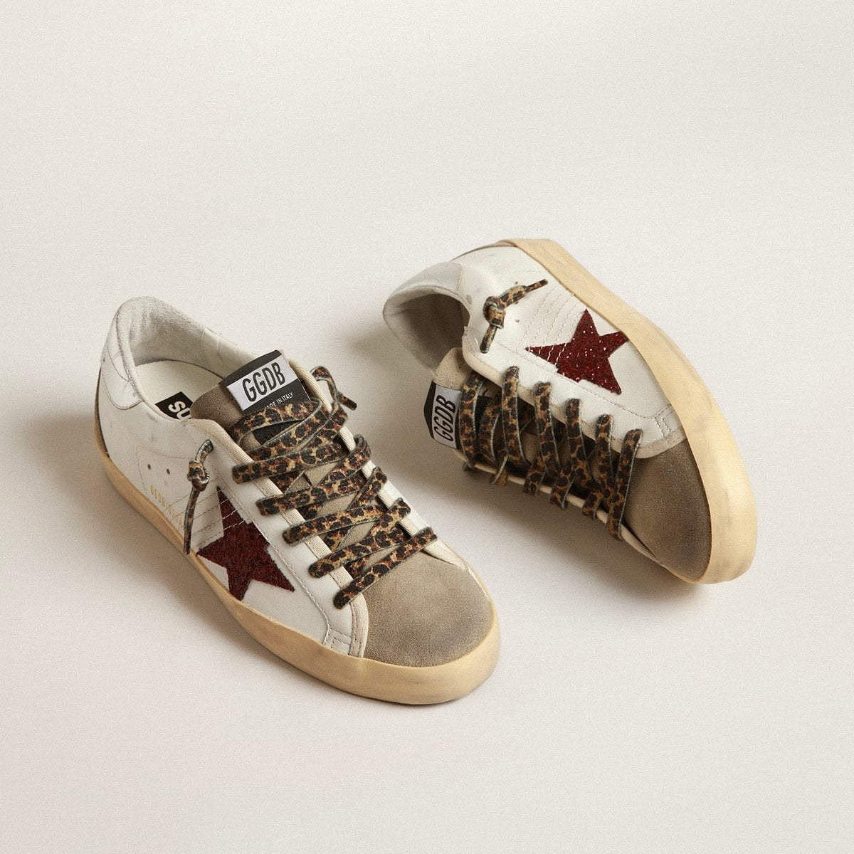 Golden Goose Super-Star with burgundy glitter star and silver heel tab(Women's)